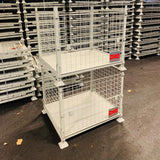Photo shows MightyLoad heavy duty pallet cages stacked on top of each other. This pallet cage can be stacked to 4 units high.