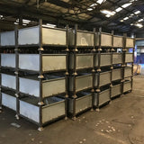 Photo of stacked heavy duty metal stillage bins ready for delivery