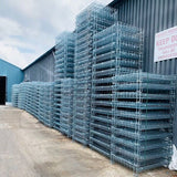 Photo shows large quantity of wire mesh pallet cages currently for sale from our online shop